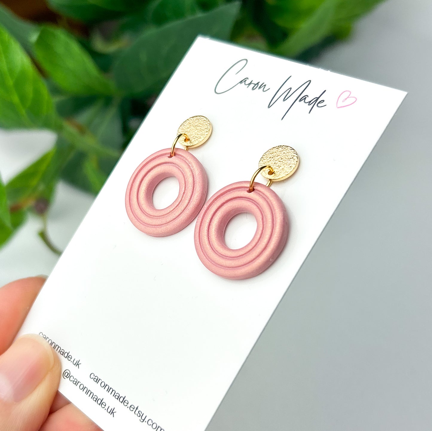 Light pearly pink round earrings