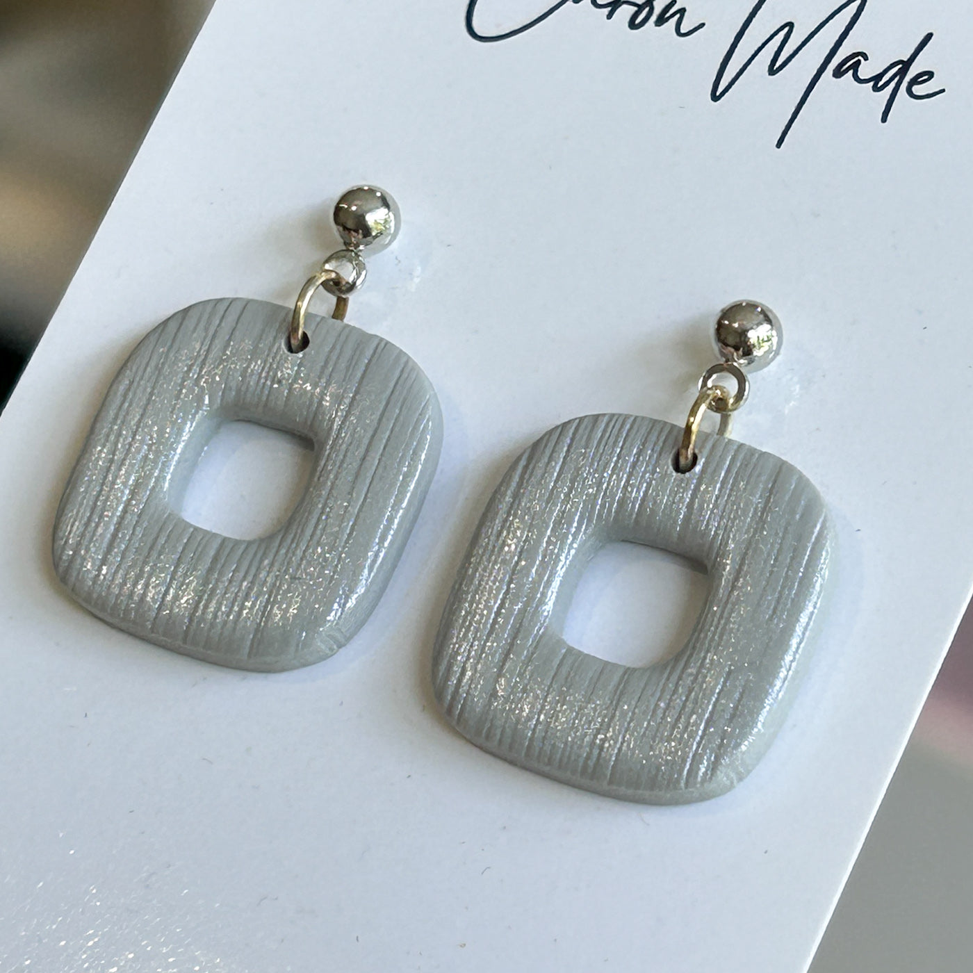 Light silver grey earrings