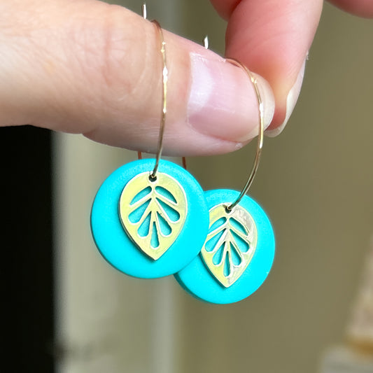 Hoop earrings with turquoise and leaf charm