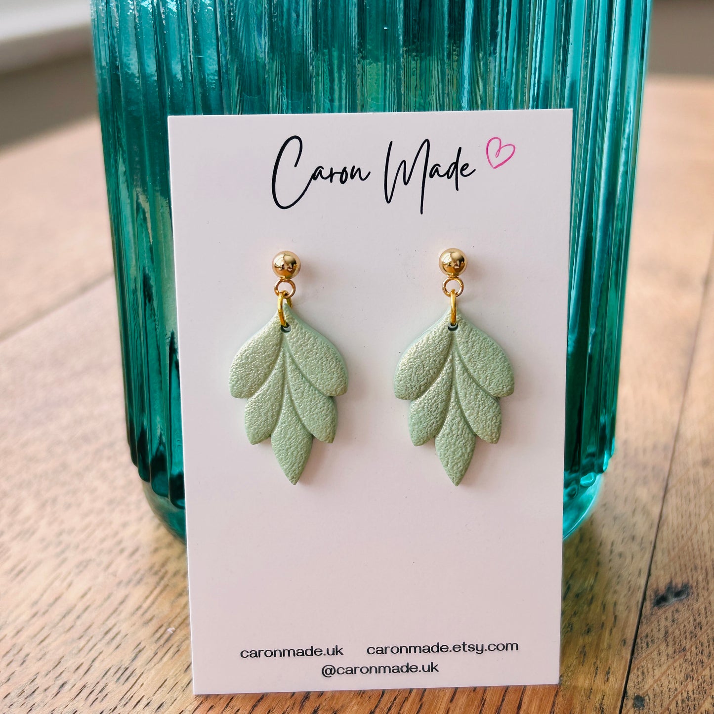 Light green floral shape earrings