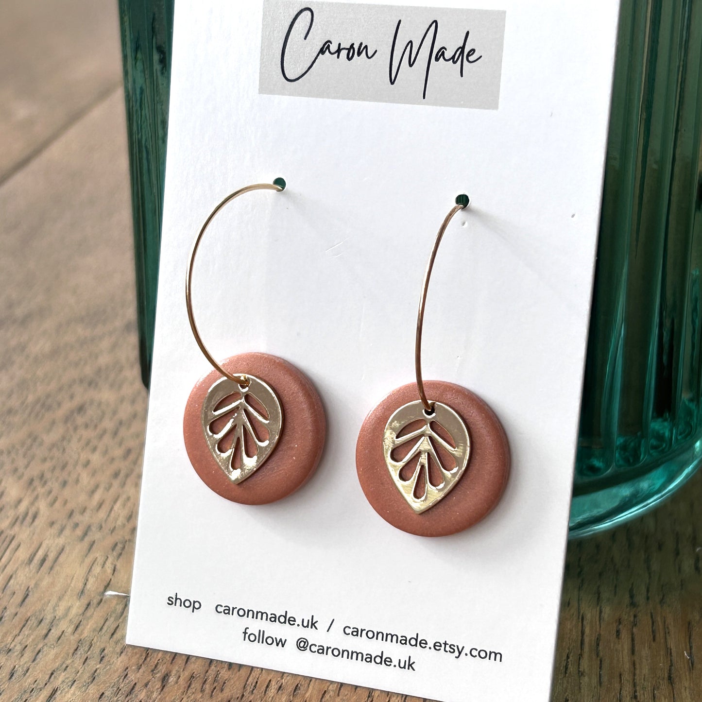 Terracotta colour earrings with leaf charm