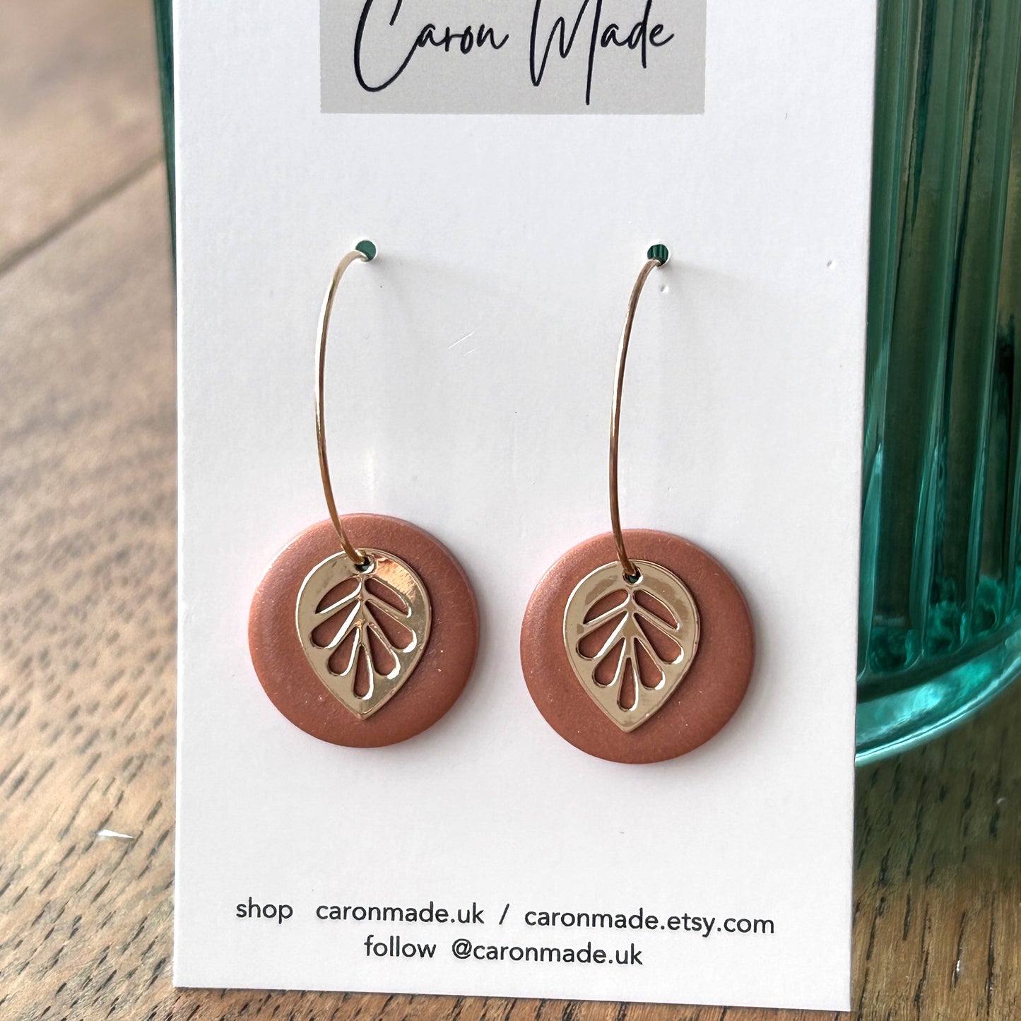 Terracotta colour earrings with leaf charm