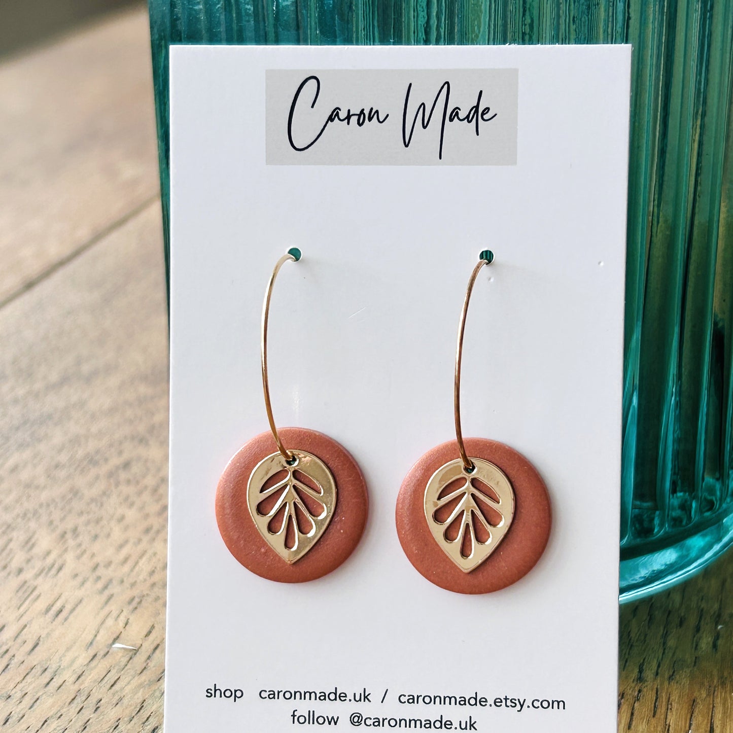 Terracotta colour earrings with leaf charm