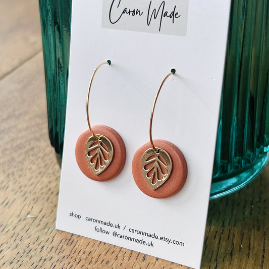 Terracotta colour earrings with leaf charm