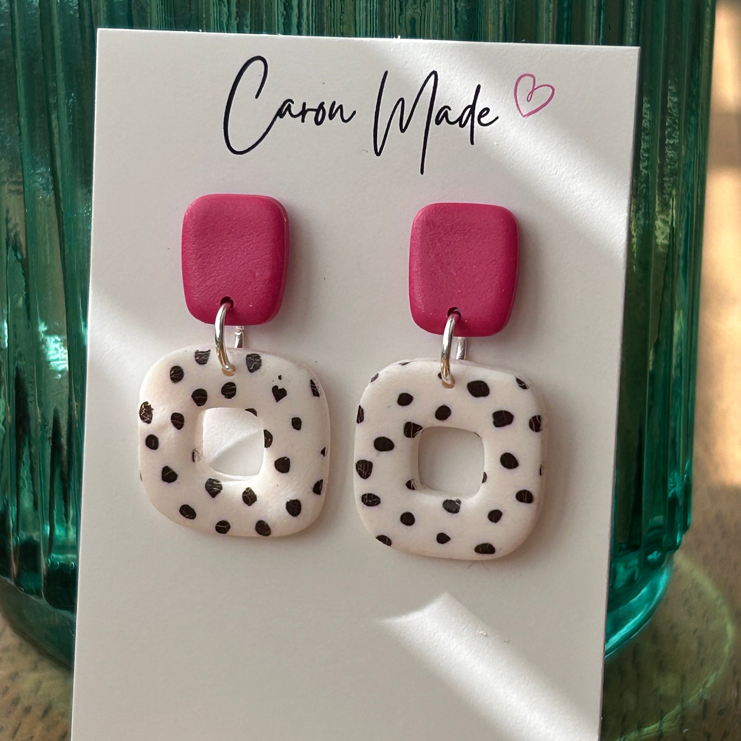 Pink and spotted rounded square earrings