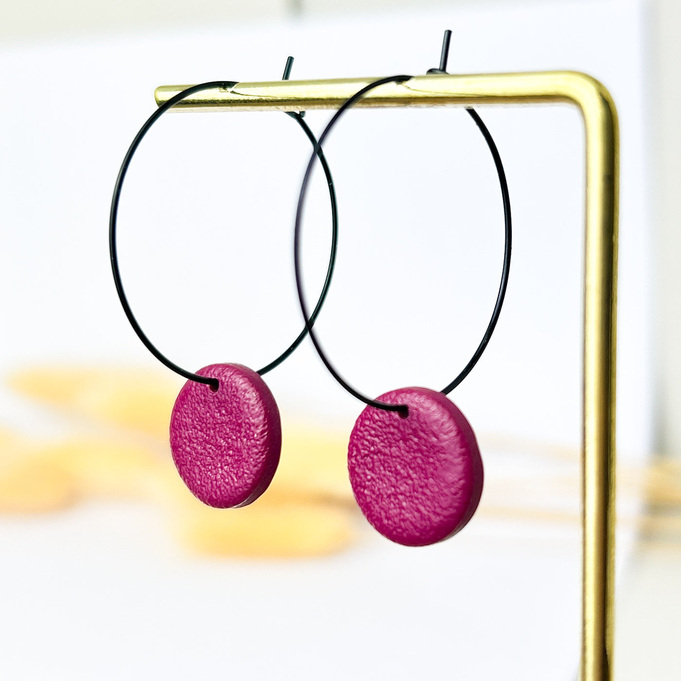 Burgundy and black hoop earrings