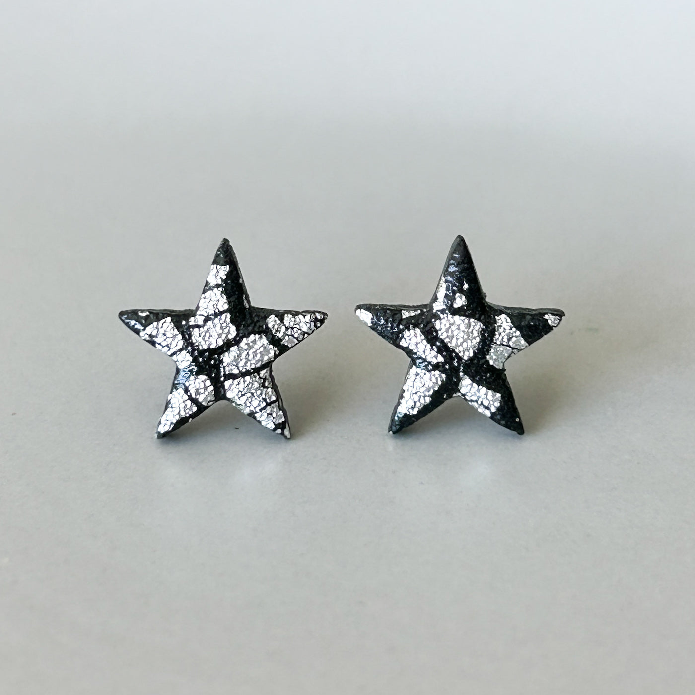 Star stud earrings, black & silver, hypoallergenic steel posts