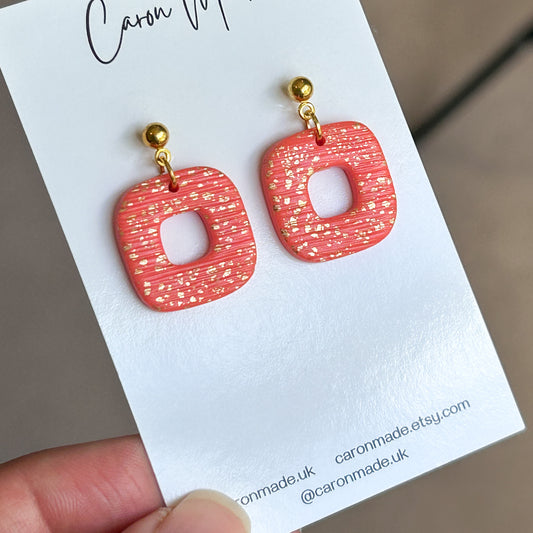 Coral and gold rounded square