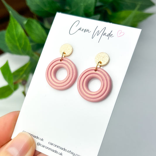 Light pearly pink round earrings