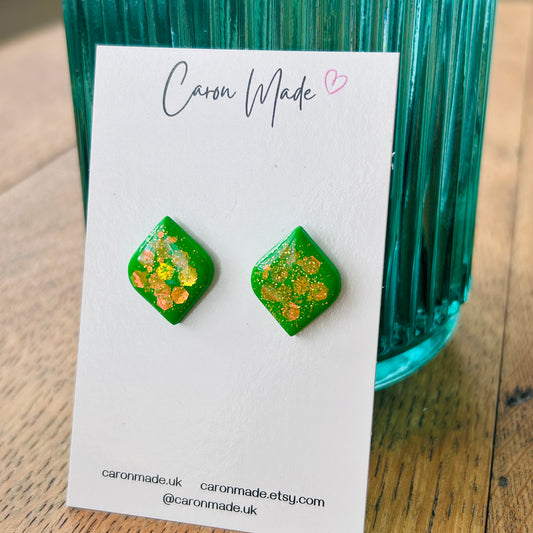 Bright green stud earrings with glitter