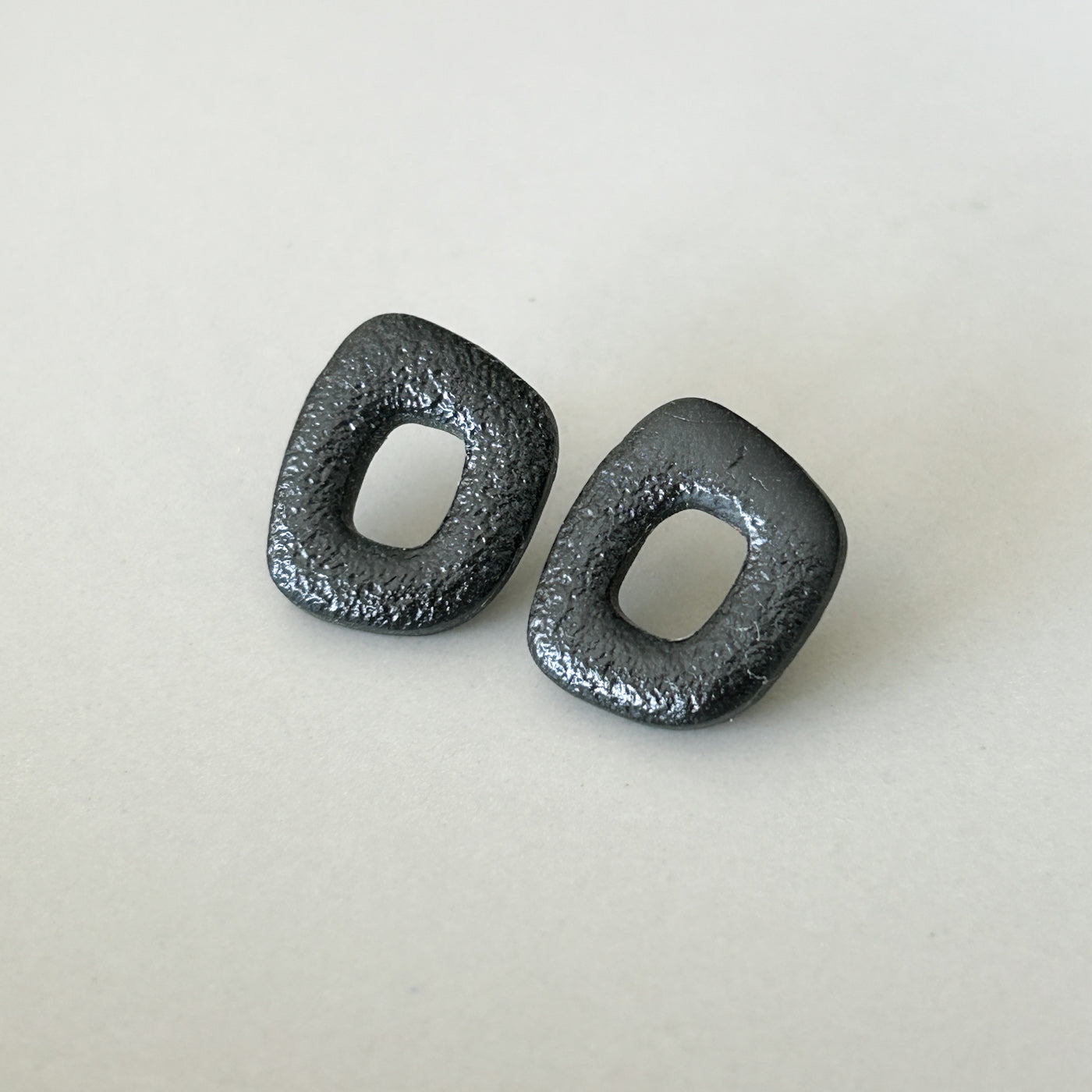 Black minimalist organic donut earrings