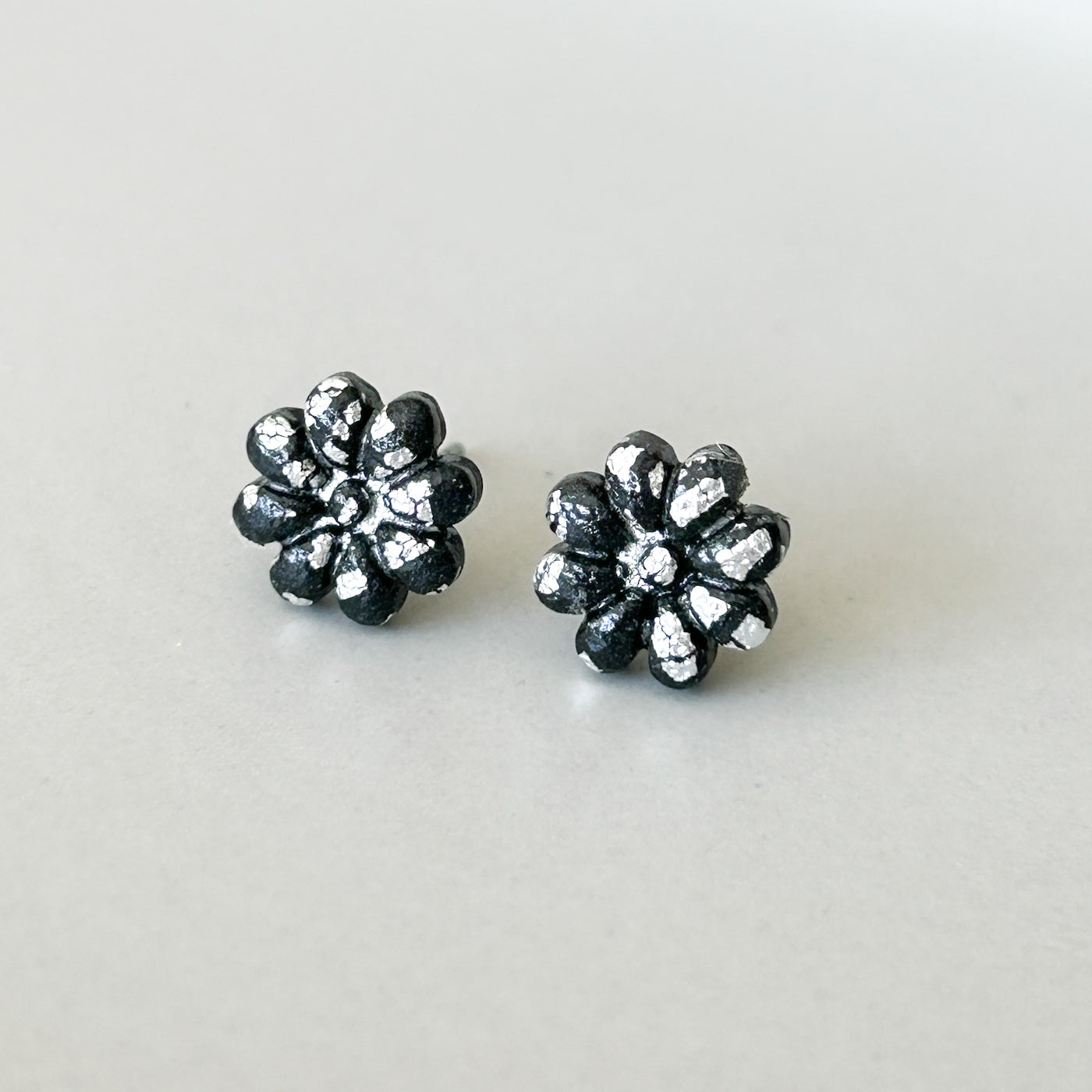 Flower stud earrings, black & silver, hypoallergenic steel posts